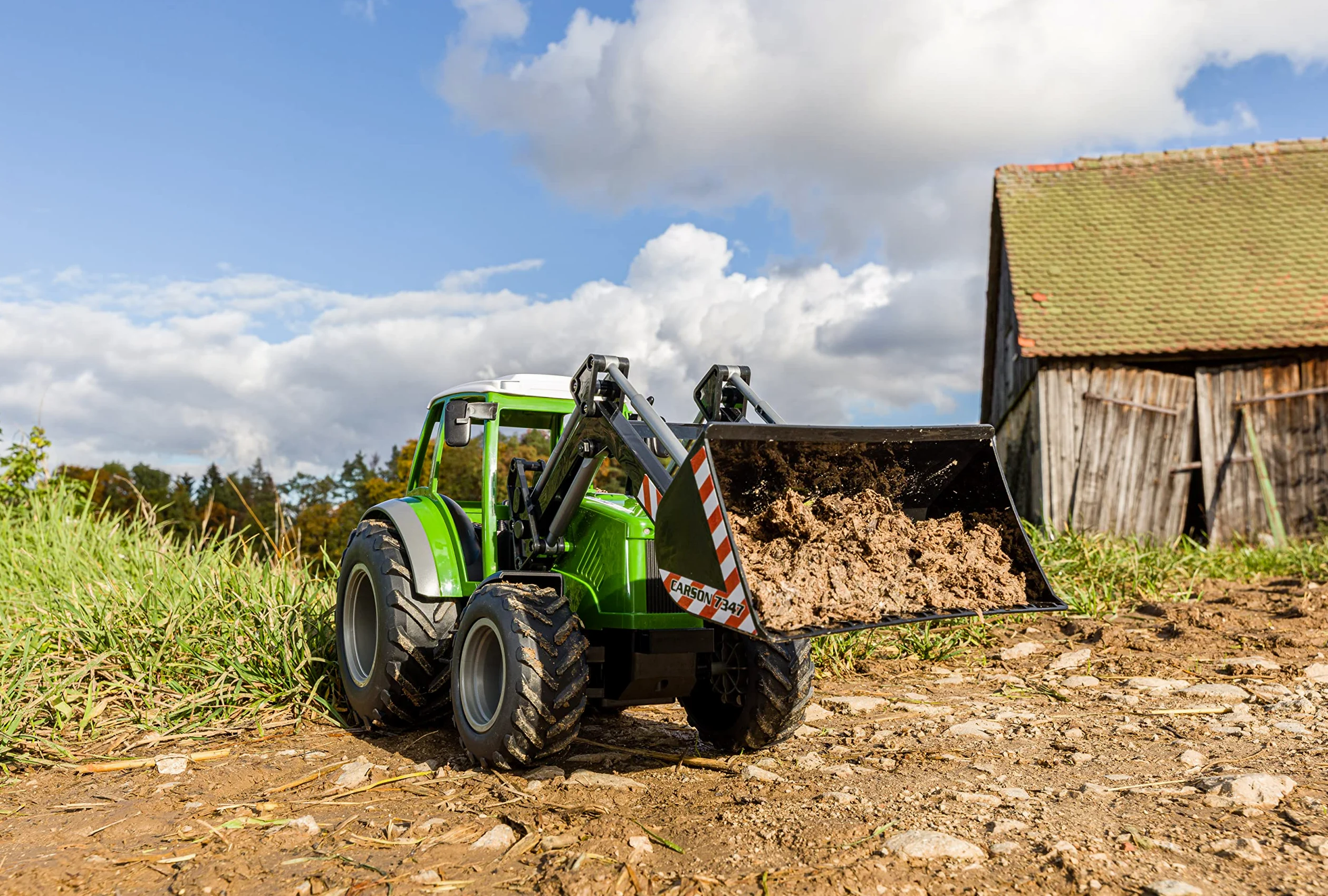 Carson 500907347 Tractor RC con Cargador Frontal 1:16 - Vehículo teledirigido, vehículo agrícola para niños a Partir de 8 años, Apto para Uso en Exteriores, Pilas y Mando a Distancia incluidos