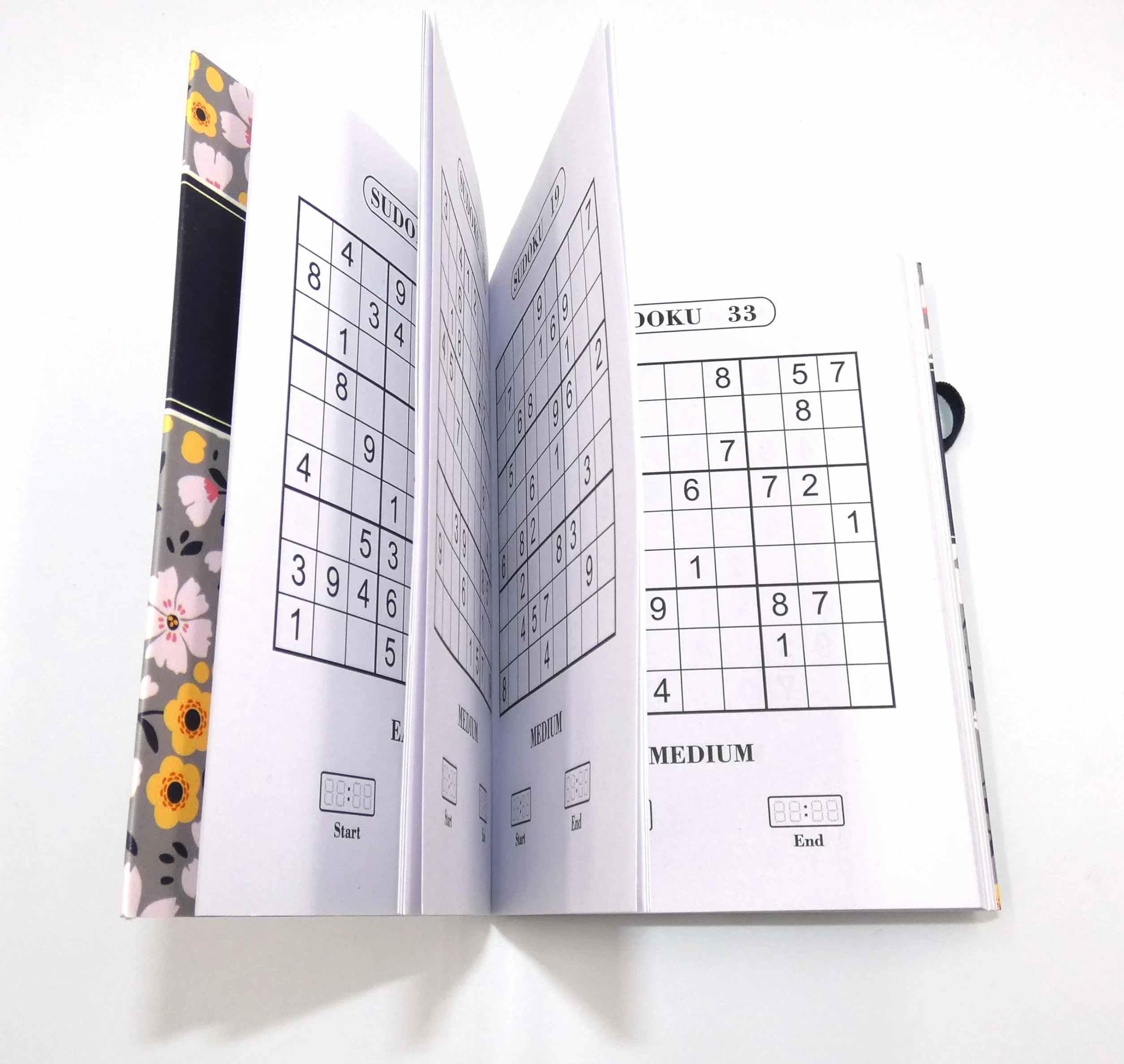 Libro de rompecabezas de sudoku A6 15x10,5 cm con banda elástica