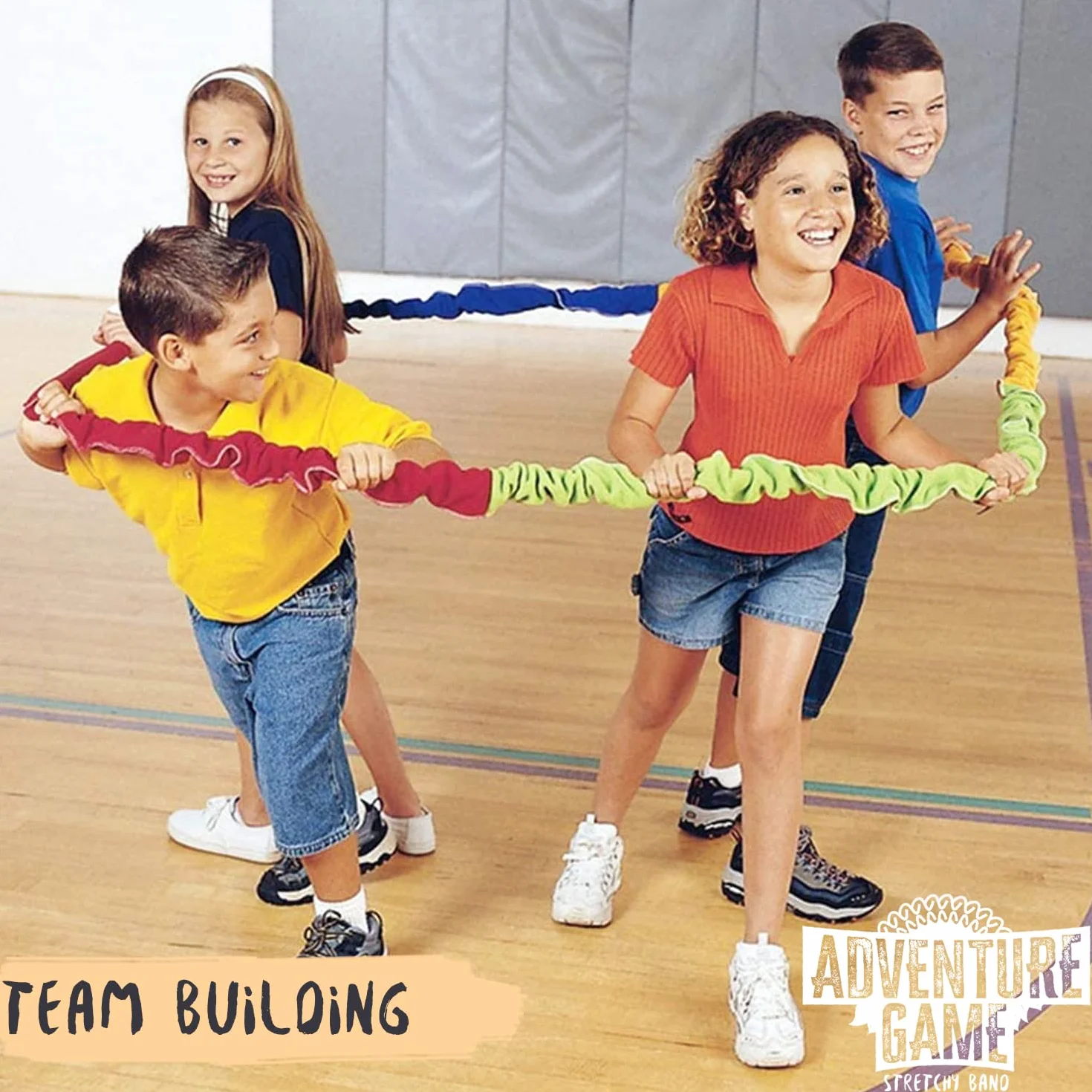 Stretchy Band® | Team Building | Juego de bandas elásticas | Tirar | Cooperación | Coordinación | Tirar de la cuerda | Al aire libre | Compartir | Equipos | Competición | Desafío | 100% diversión