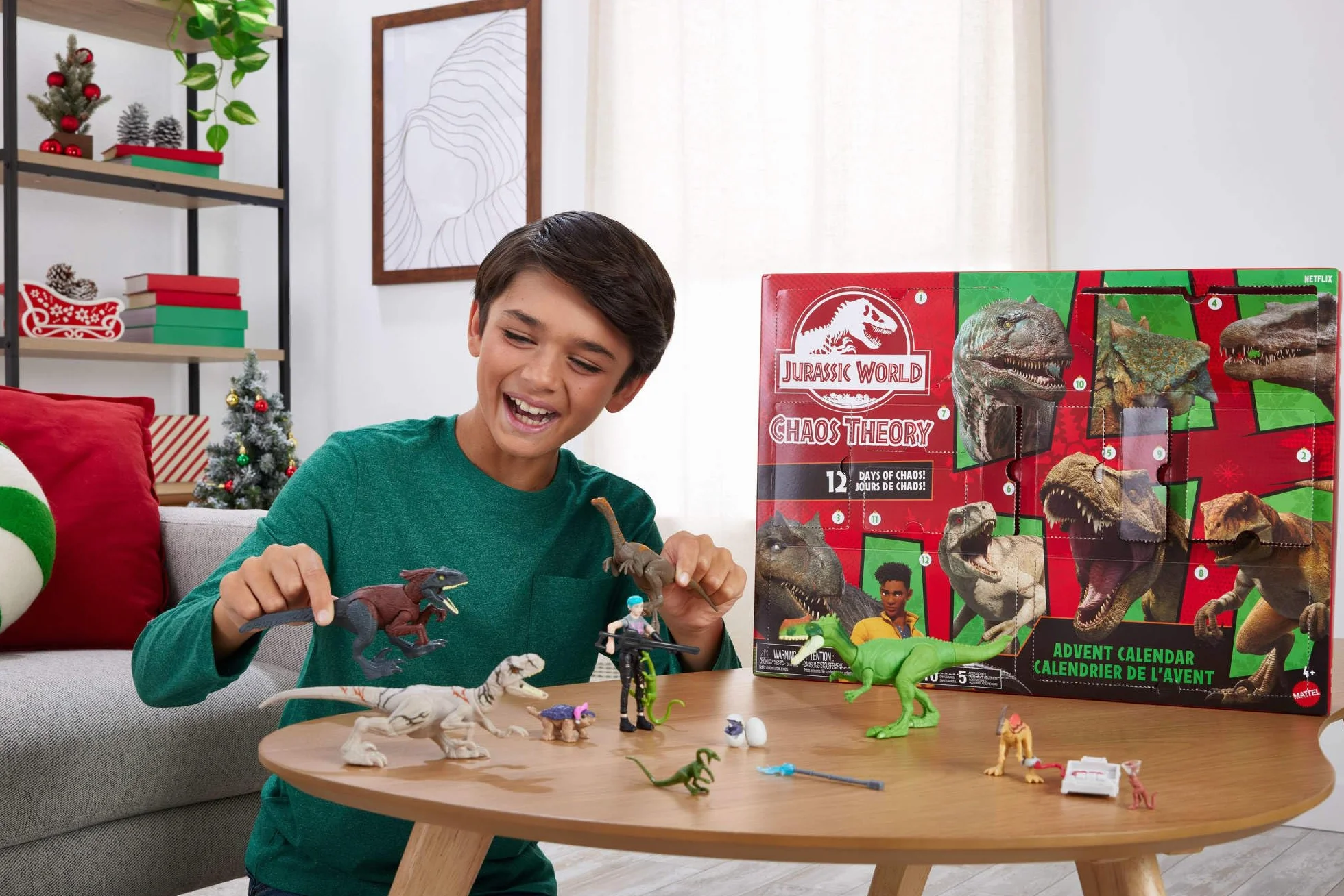 Mattel Jurassic World Teoría del Dinocaos Calendario de Adviento con 12 Puertas, 12 días de sorpresas, Smoothie y Otras 9 Figuras de Dinosaurios, Figura de Brooklynn, JGM17