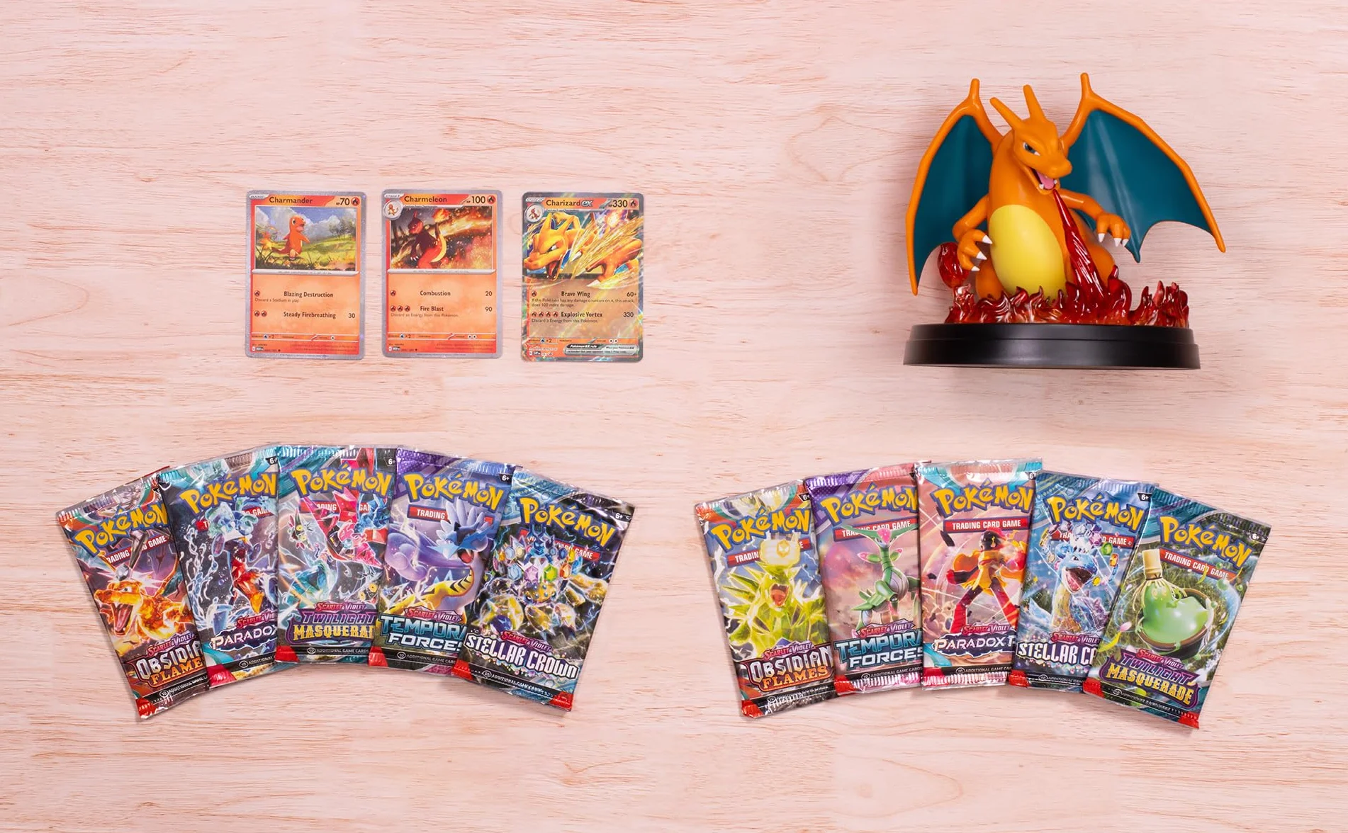 Pokémon: Colección superprémium Charizard ex (3 Cartas holográficas de promoción, 1 Figura para exhibir una Carta y 10 Sobres de Mejora)