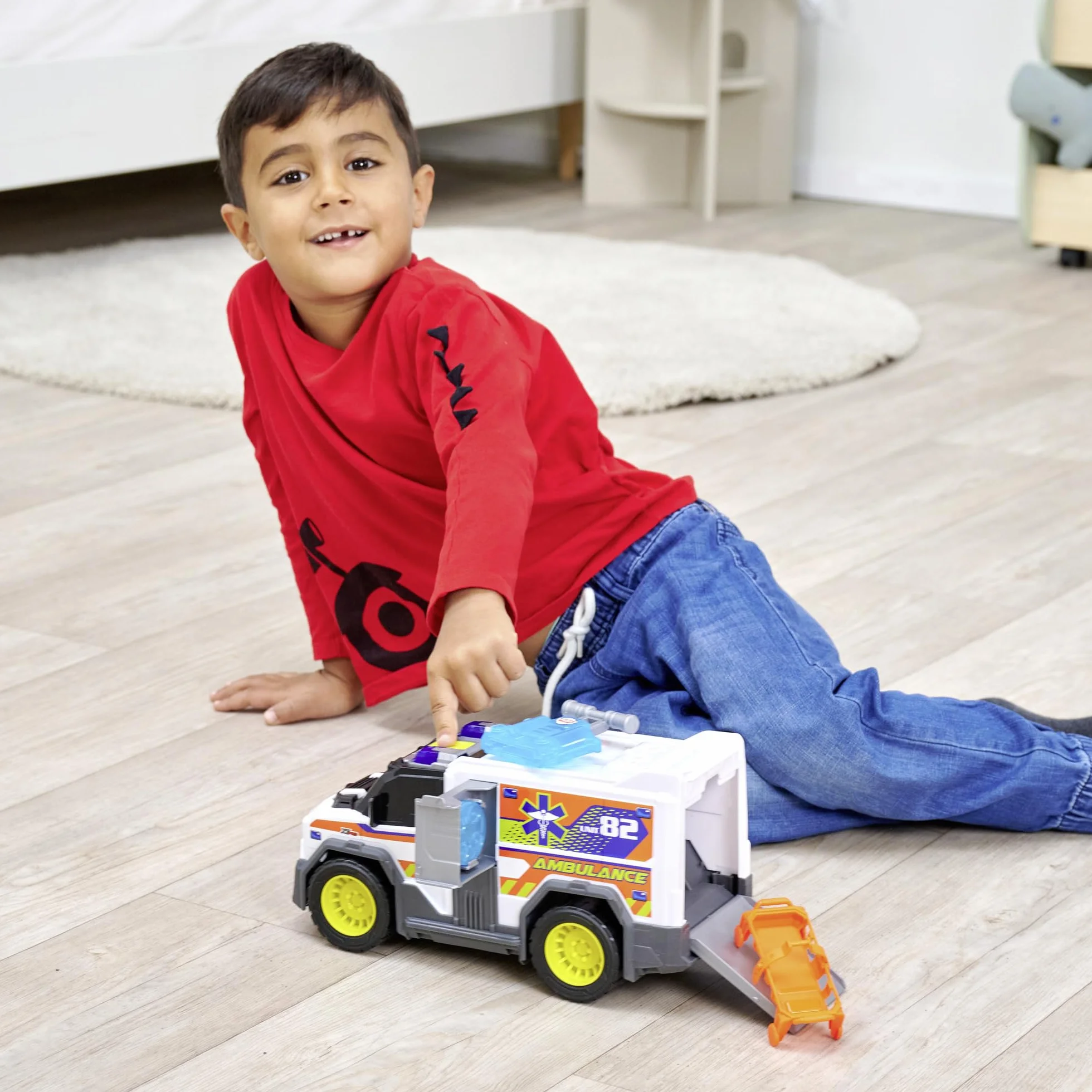 Dickie Toys City Heroes Ambulancia 30cm con luz y Sonido, rampa para Camilla,Compartimento de almacenaje y Lanzador de Discos. A Partir de 3 años (203306024)
