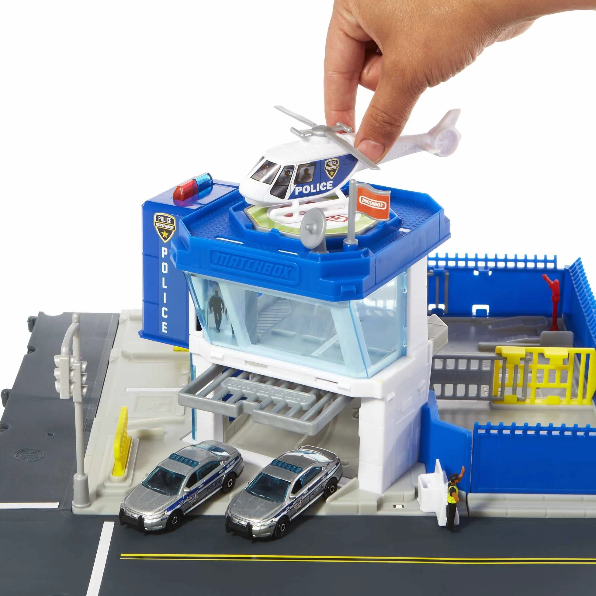 Matchbox Action Drivers Estación de policía Set de Juego con Pistas para Coches de Juguete con Sonidos, Incluye 1 vehículo y 1 helicóptero, +3 años (Mattel HHW22)