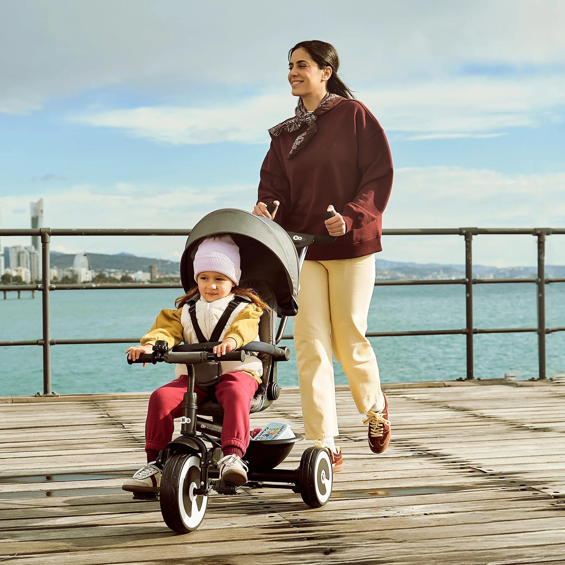 Kinderkraft Aston 2 Pro Triciclo Evolutivo, Bicicleta Sin Pedales, Bicicleta Bebe, para Niños, Cinturón, con Accesorios, Portavasos, Cesta, 9 Meses a 25 kg, Rosa