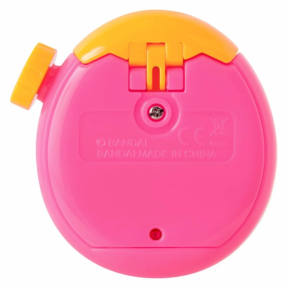 Tamagotchi Paradise Orange Tropics – Juguete Interactivo Tamagotchi – Rueda giratoria con Zoom – Modelo Rosa y Amarillo – Juguete para niños a Partir de 6 años – Bandai – 43425