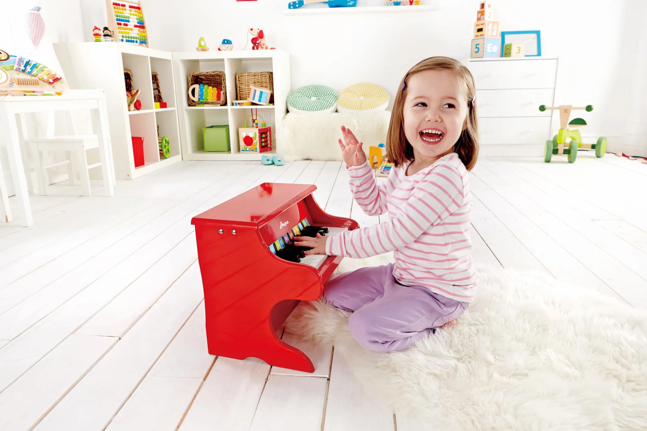 Hape Mini Piano, Mini Instrumento Musical de Madera de Juguete con 18 Teclas, Rojo