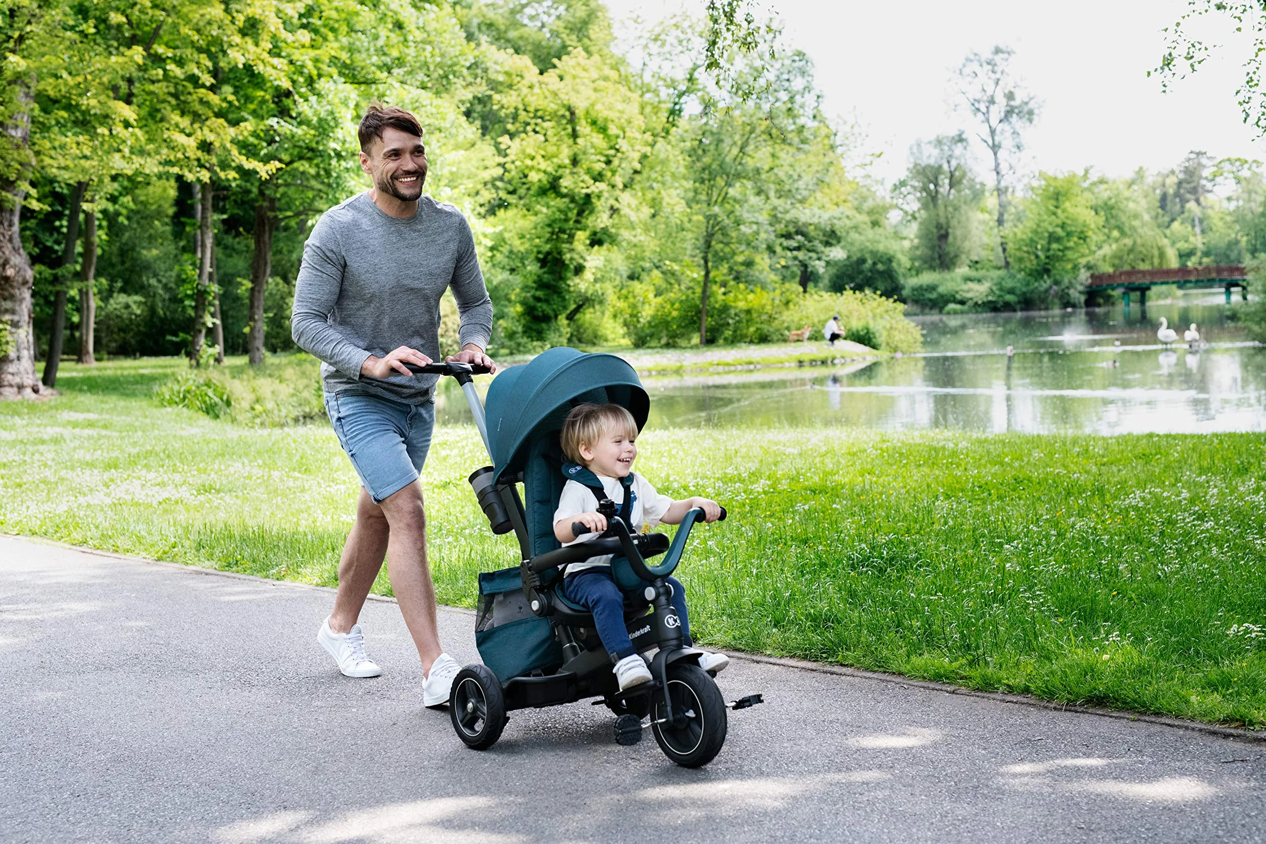 Kinderkraft EASYTWIST Triciclo Infantil, con Accesorios, Ventana de Techo, Cinturones de Seguridad, rotación de 360 Grados, Rueda Libre, Barra de Empuje, a Partir de 9 Meses hasta 5 años, Rosa